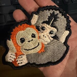 Embroidered Punch The Monkey - Gray & Orange